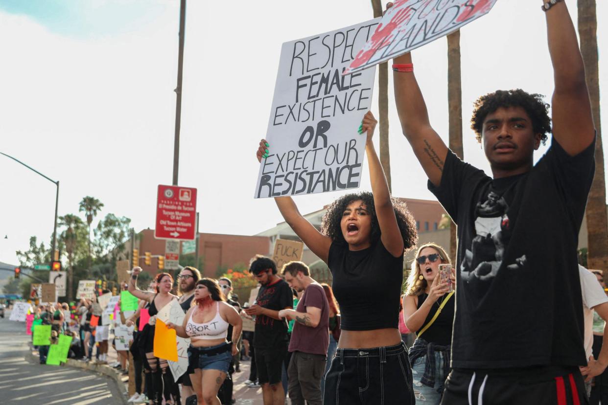 <span>Abortion rights activists in Tucson, Arizona on 4 July 2022.</span><span>Photograph: Sandy Huffaker/AFP/Getty Images</span>