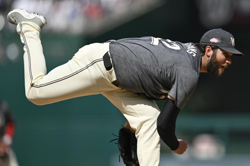 Washington Nationals starting pitcher Trevor Williams throws during the second inning of a baseball game against the Seattle Mariners, Saturday, May 25, 2024, in Washington. (AP Photo/John McDonnell)