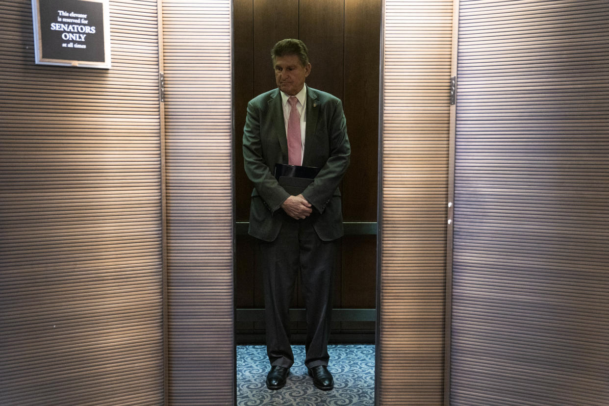 WASHINGTON, DC - JANUARY 20: Sen. Joe Manchin, D-W.Va., departs from his office in Hart Senate Office Building on Capitol Hill on Thursday, Jan. 20, 2022 in Washington, DC. (Photo by Sarah Silbiger for The Washington Post via Getty Images)
