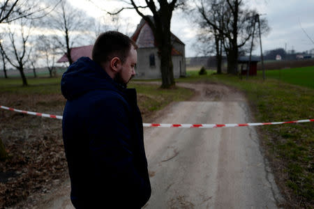 Mariusz Milewski walks at the Sanctuary of Mother of God in Wardegowo village, Poland, February 17, 2019. Picture taken February 17, 2019. REUTERS/Kacper Pempel