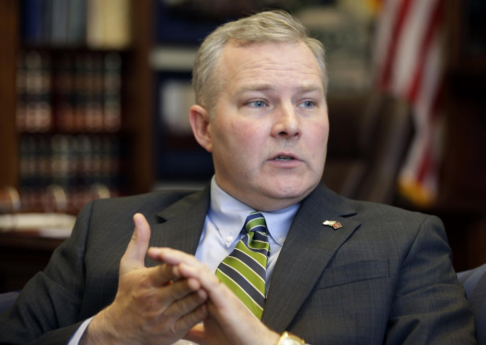 FILE - Arkansas Lt. Gov. Tim Griffin is interviewed in his office at the state Capitol, Jan. 16, 2015, in Little Rock, Ark. Twenty-six Republican attorneys general filed lawsuits Wednesday, May 1, 2024, challenging a new Biden administration rule requiring firearms dealers across the United States to run background checks on buyers at gun shows and other places outside brick-and-mortar stores. “Congress has never passed into law the ATF’s dramatic new expansion of firearms dealer license requirements, and President Biden cannot unilaterally impose them,” Arkansas Attorney General Griffin said in a statement. (AP Photo/Danny Johnston, File)