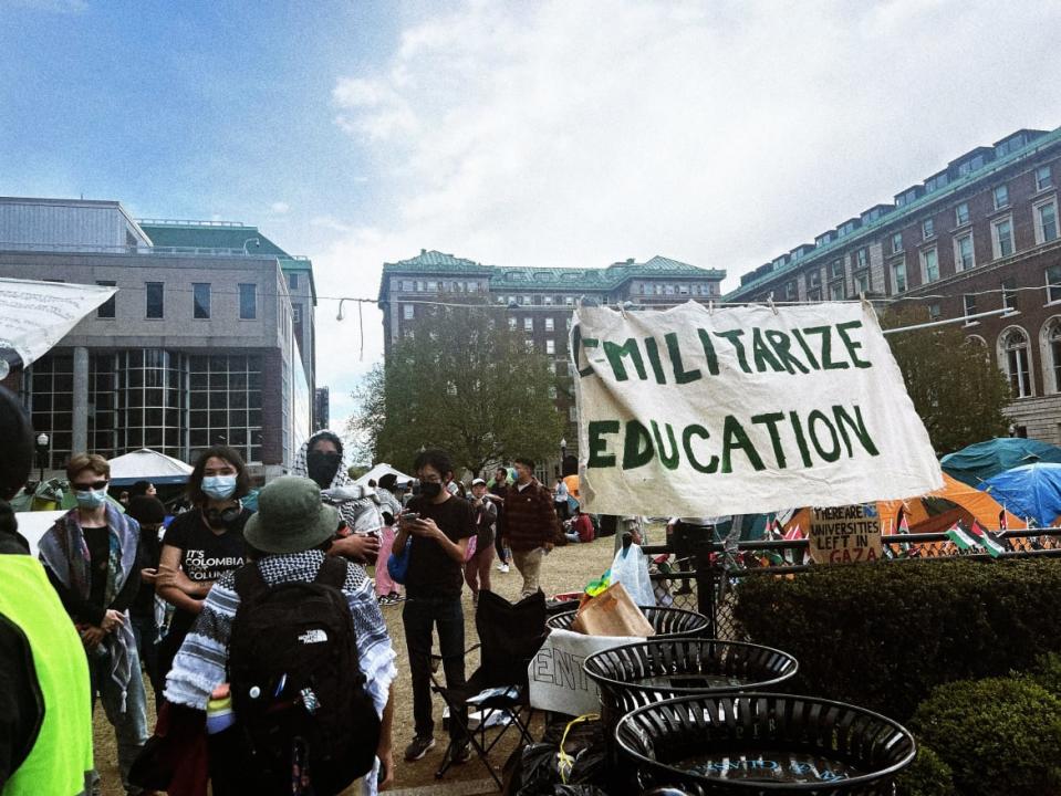 Protesters gather in the center of Columbia University ahead of an afternoon visit from House Speaker Mike Johnson.