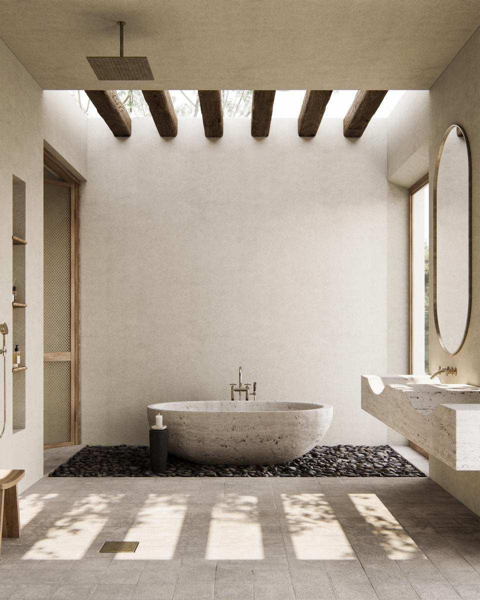 Warm white bathroom with stone freestanding bath