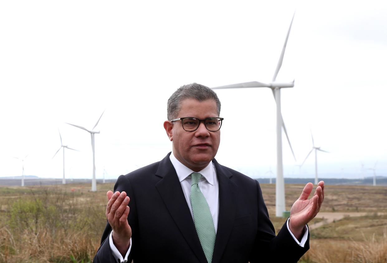 <p>Alok Sharma called on the world to abandon coal while standing in front of Whitelee Windfarm in Glasgow on Friday</p> (Getty)
