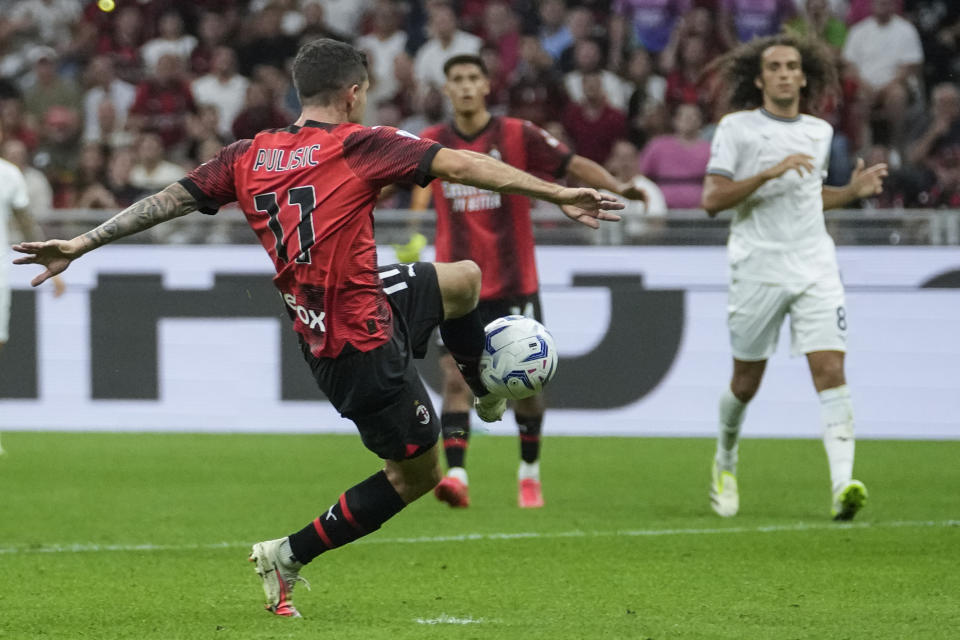 AC Milan's Christian Pulisic scores his side's opening goal during a Serie A soccer match between AC Milan and Lazio, at the San Siro stadium in Milan, Italy, Saturday, Sept. 30, 2023. (AP Photo/Luca Bruno)