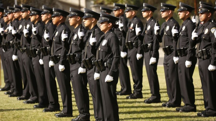 New police officers participate at a graduation exercise at the Los Angeles Police Academy in April 2018. (Credit: Al Seib / Los Angeles Times)