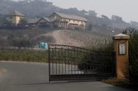 <p>The entrance sign to Nicholson Ranch vineyards, which was consumed by fires in Sonoma, Calif., Oct. 10 2017. (Photo: John G. Mabanglo/EPA-EFE/REX/Shutterstock) </p>