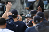 DETROIT, MI - OCTOBER 13: Alex Avila #13 of the Detroit Tigers celebrates in the dugout after hitting a solo home run in the third inning of Game Five of the American League Championship Series against the Texas Rangers at Comerica Park on October 13, 2011 in Detroit, Michigan. (Photo by Harry How/Getty Images)