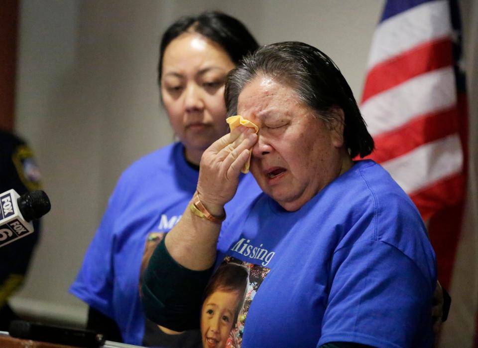 The grandmother of missing Elijah Vue, right, cries during the press conference held about his recent disappearance at the Two Rivers city hall, Tuesday, February 27, 2024, in Two Rivers, Wis. At left is Vue's aunt.