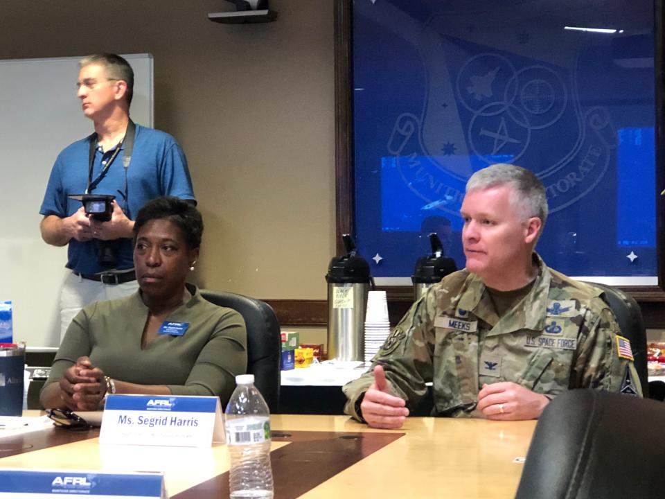 U.S. Space Force Col. Tony Meeks (right) commander of the Air Force Research Laboratory's Munitions Directorate at Eglin Air Force Base, and Segrid Harris, the directorate's senior scientific technical manager, take questions from the media and other guests during an April 21 briefing on the QUICKSINK initiative, which was successfully demonstrated Thursday in the Gulf of Mexico.