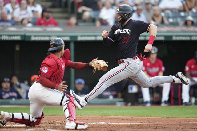 Lewis slam in 9-run inning, Twins beat virus-hit Guardians