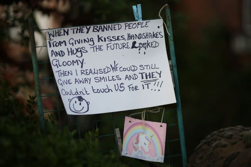 A message is pinned to the gatepost of a house as the spread of the coronavirus disease (COVID-19) continues, in Sale