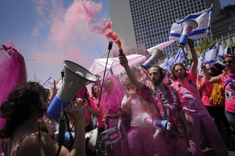 Israelis protest against plans by Prime Minister Benjamin Netanyahu's government to overhaul the judicial system, in Tel Aviv, Israel, Thursday, May 4, 2023. (AP Photo/Ohad Zwigenberg)