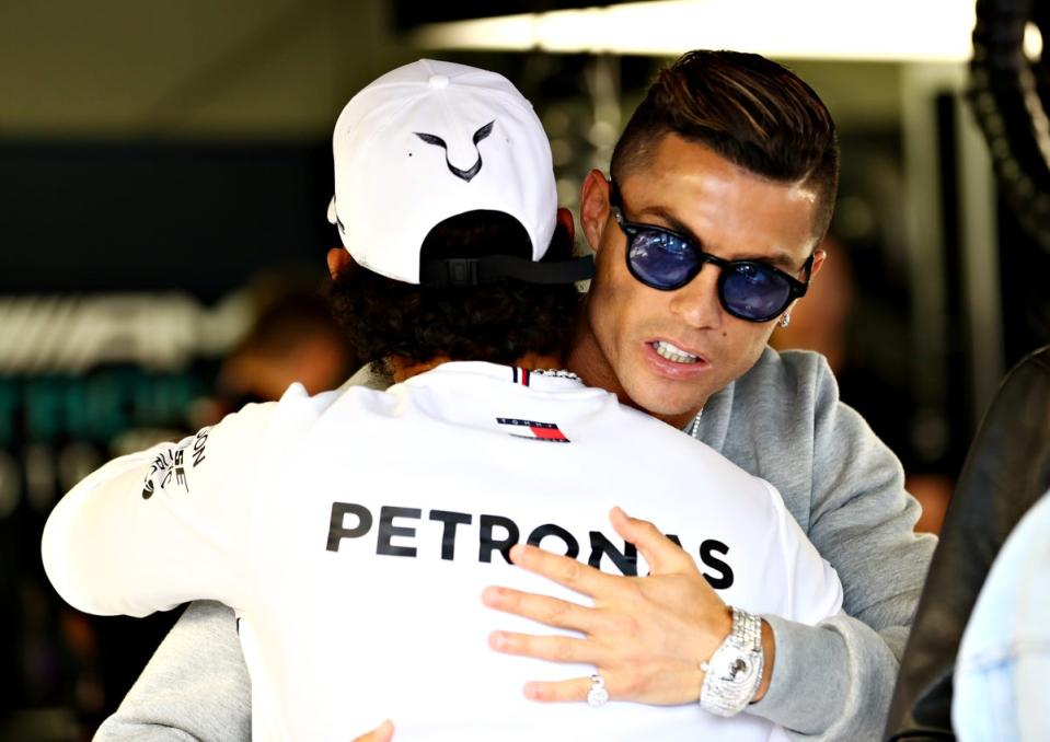 Lewis Hamilton and Cristiano Ronaldo embrace in Monaco in 2019 (Getty Images)