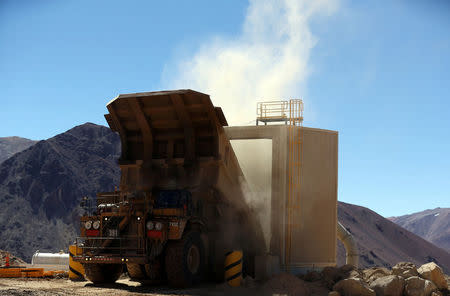 A dump truck unloads minerals at Barrick Gold Corp's Veladero gold mine in Argentina's San Juan province, April 26, 2017. REUTERS/Marcos Brindicci