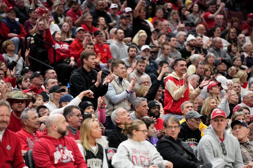 Feb 18, 2024; Columbus, Ohio, USA; Fans cheer during the NCAA men’s basketball game between the Ohio State Buckeyes and the Purdue Boilermakers at Value City Arena. Ohio State won 73-69.