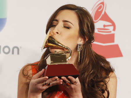 Venezuelan/Canadian singer and songwriter Mariana Vega poses with her Best New Artist award. REUTERS/Steve Marcus