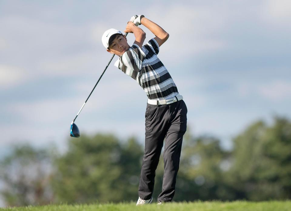 Quaker Valley freshman Ethan Dai tees off during the WPIAL AA boys championship, Thursday at Allegheny Country Club in Sewickley. Dai placed ninth overall.