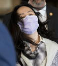 Meng Wanzhou leaves B.C. Supreme Court in Vancouver, British Columbia, Monday, Sept. 28, 2020. The senior executive for Chinese communications giant Huawei Technologies was in court arguing that her extradition to the U.S. should be halted because her rights have been violated. (Jonathan Hayward/The Canadian Press via AP)