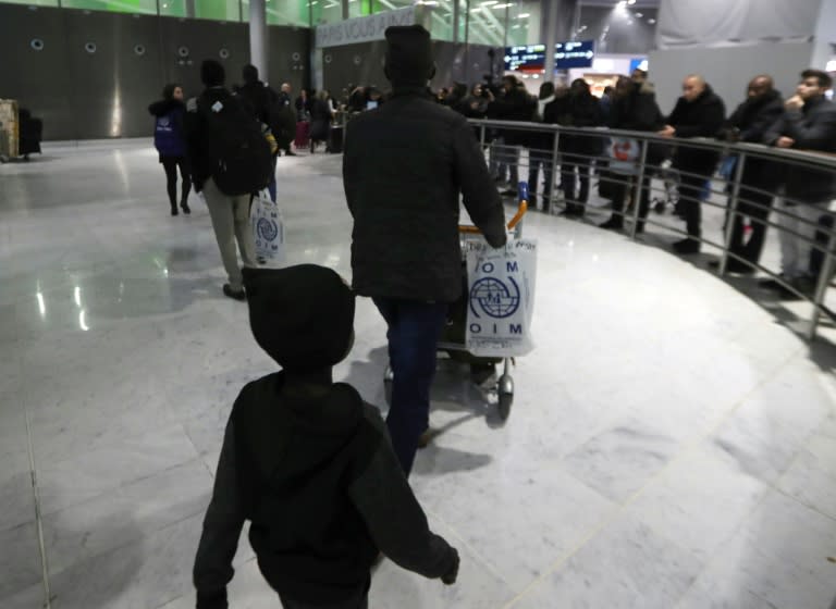 Sudanese refugees arrive at the Roissy-Charles de Gaulle airport, near to Paris, on December 18, 2017, as part of the first group from missions from the French Office for the Protection of Refugees and Stateless People in Africa