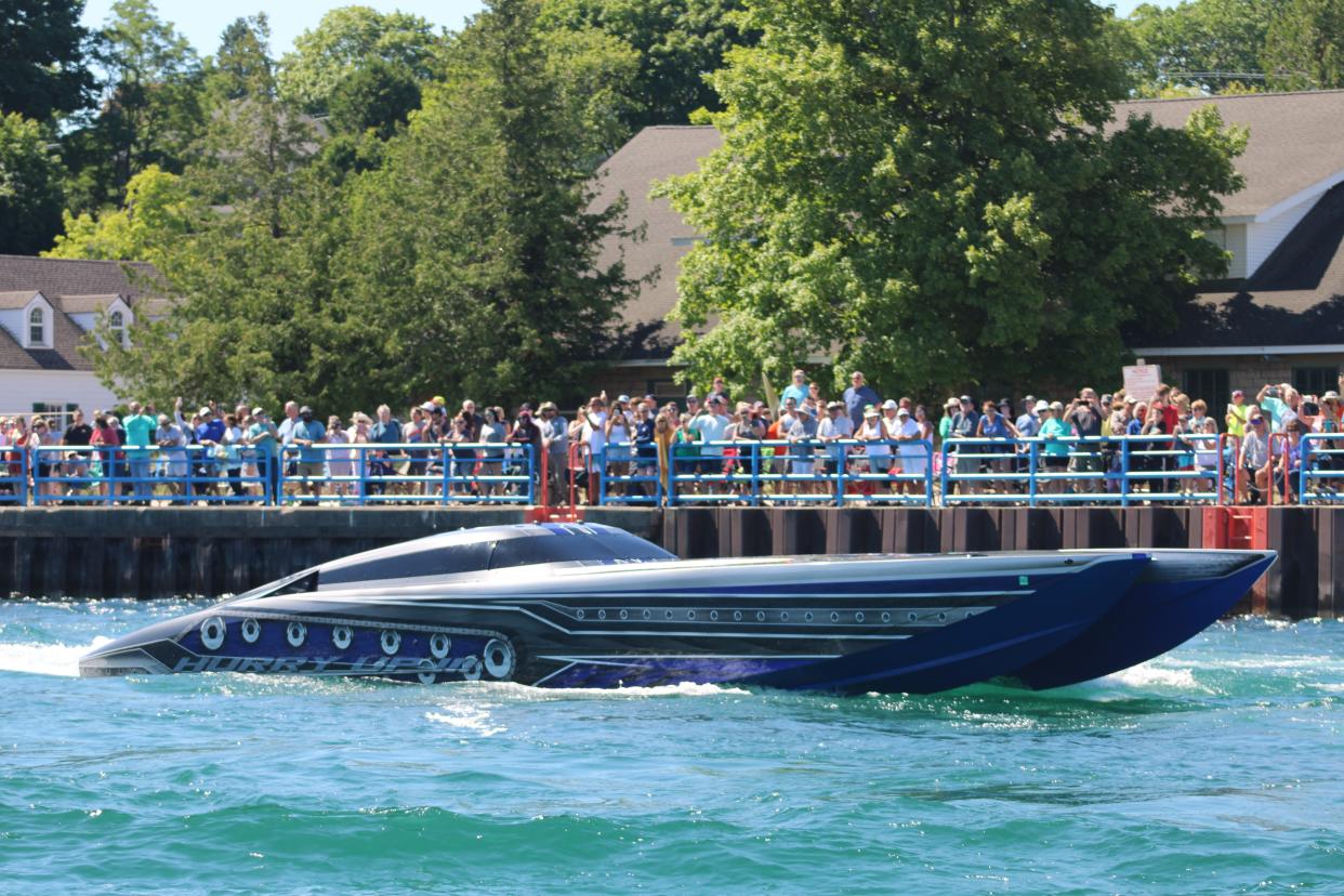 Boyne Thunder powerboats roar through Charlevoix's channel as the crowd cheers them on during the 2022 event.