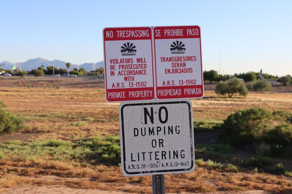 A no trespassing sign sits at the entrance to a city-owned retention basin in Goodyear that often floods during monsoon season on Oct. 15, 2021. Police in Goodyear and other cities across the valley have increasingly turned to trespassing enforcement against people experiencing homelessness following an appeals court ruling that made it more difficult for them to enforce anti-camping ordinances.