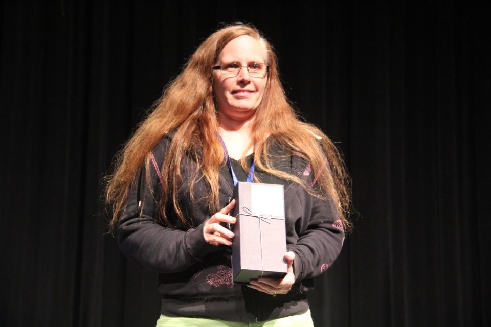 Perry Schools staff members receive 30 years of service awards during a presentation on Wednesday, May 22, 2024.