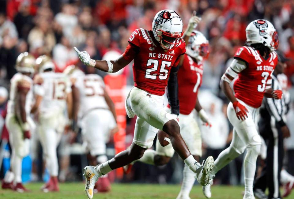 N.C. State cornerback Shyheim Battle (25) celebrates after intercepting the ball during the second half of N.C. State’s 19-17 victory over Florida State at Carter-Finley Stadium in Raleigh, N.C., Saturday, Oct. 8, 2022.