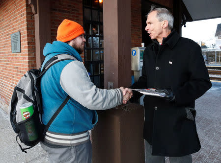 U.S. Congressman Daniel Lipinski (R) campaigns for re-election at the Chicago Ridge Metra commuter train station in Chicago Ridge, Illinois, U.S. January 25, 2018. Picture taken January 25, 2018. REUTERS/Kamil Krzacznski