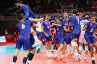 <p>Team France reacts after defeating Team ROC to win gold in Men's Volleyball. </p>