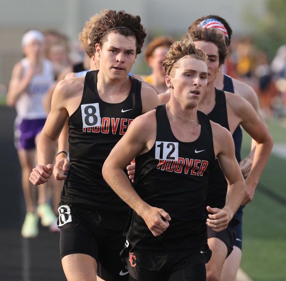 Blaze Fichter, 12, and Noah Johnson, 8, both of Hoover finished first and second in the boys 1600 meter run during the DI district track and field meet at Hoover on Friday, May 20, 2022.