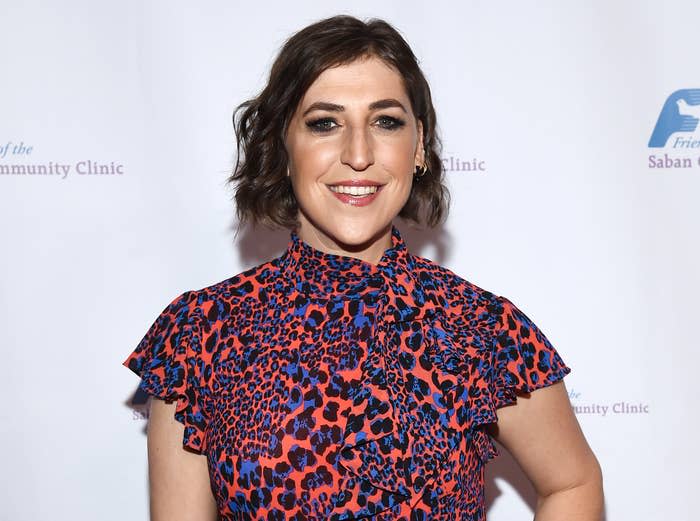 Mayim smiles while attending an event