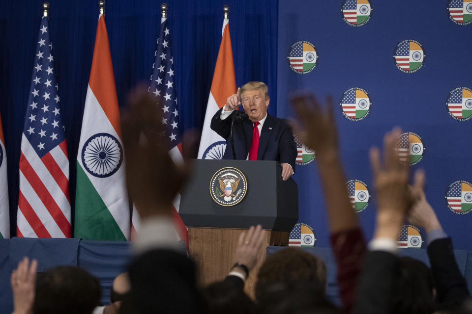 U.S.President Donald Trump points to a question during a news conference, Tuesday, Feb. 25, 2020, in New Delhi, India. (AP Photo/Alex Brandon)