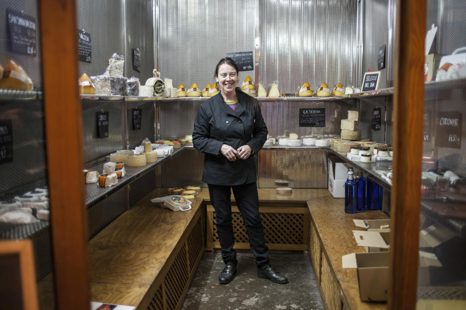 Katherine McLaughlin in her cheese shop in the Gothic Quarter of Barcelona Dec. 19. (Photo: Jose Colon/MeMo for Yahoo News)