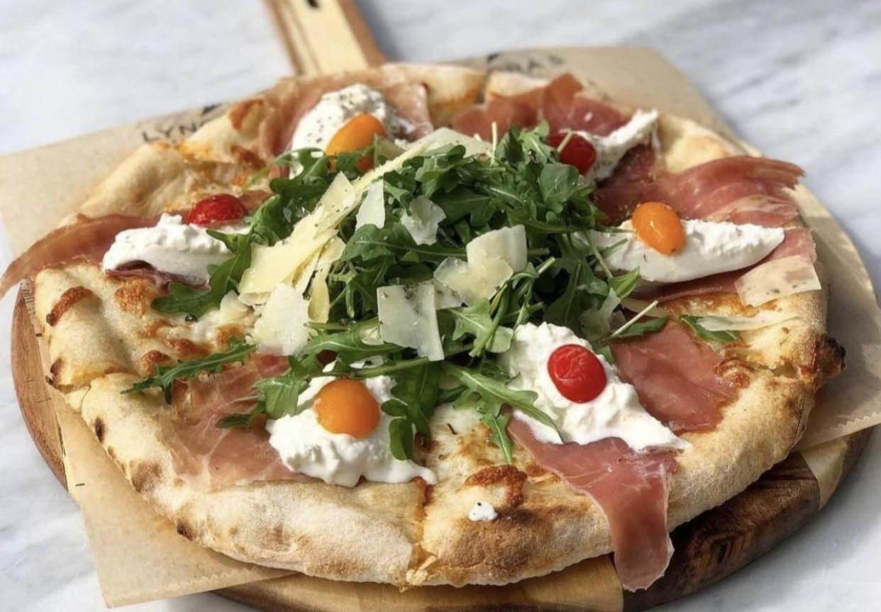 On the menu at Lynora's restaurants: Burrata and prosciutto pizza with arugula, cherry tomatoes and extra virgin olive oil.