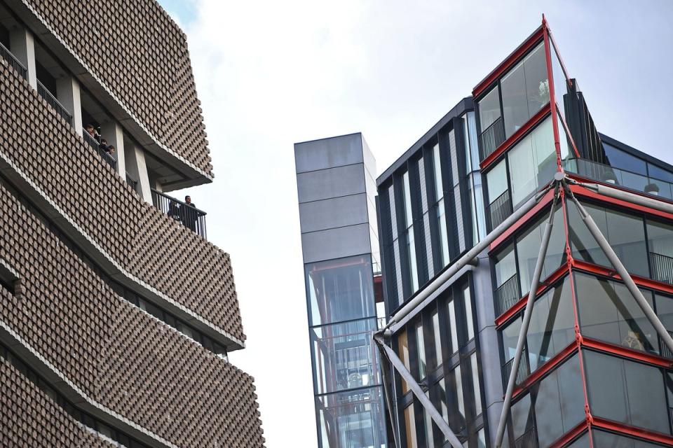 The owners living in residential flats (right) which are over looked by the Tate Modern (PA Archive)