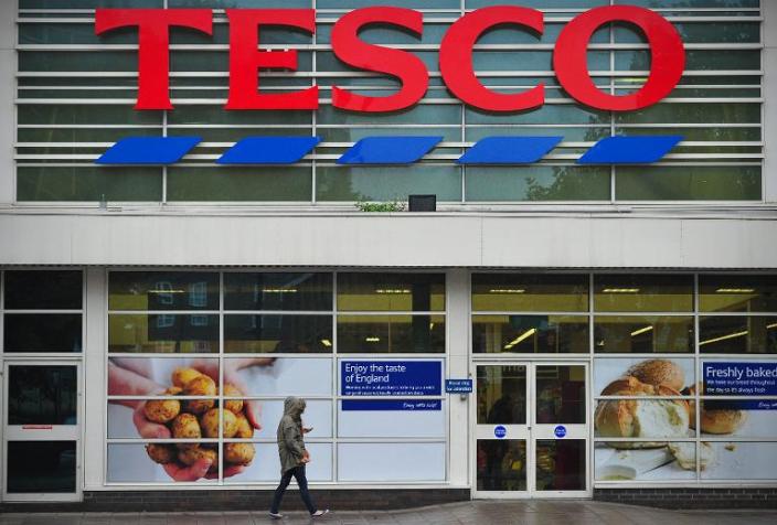 Tesco is suffering from fierce competition in Britain from supermarket price wars and German-owned discounters Aldi and Lidl (AFP Photo/Carl Court)