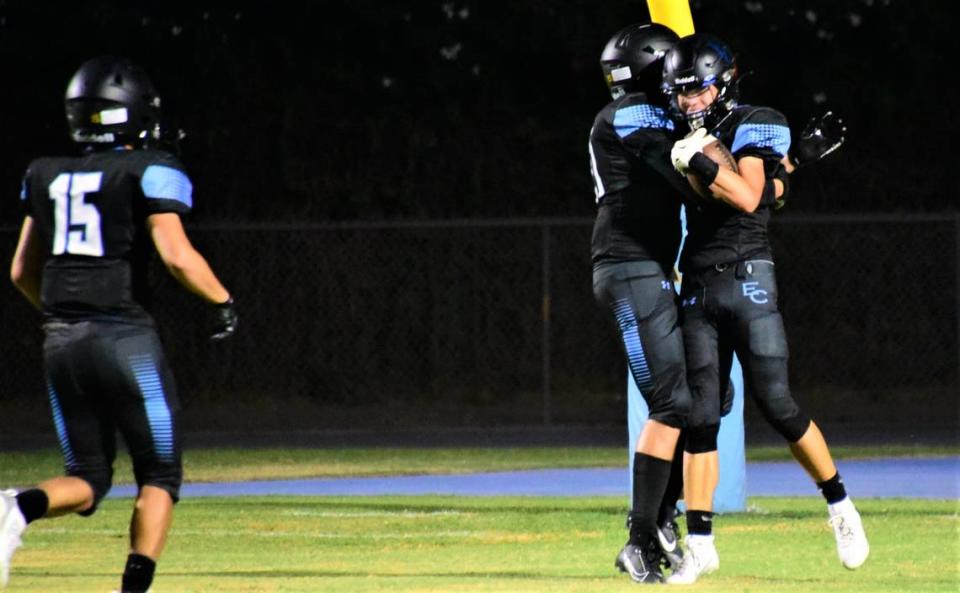 El Capitan High School receiver Diego Ultreras (right) celebrates with his teammates after scoring a 50-yard touchdown catch in the second quarter against Cordova on Friday, Aug. 25, 2023 at Merced College’s Stadium ’76.