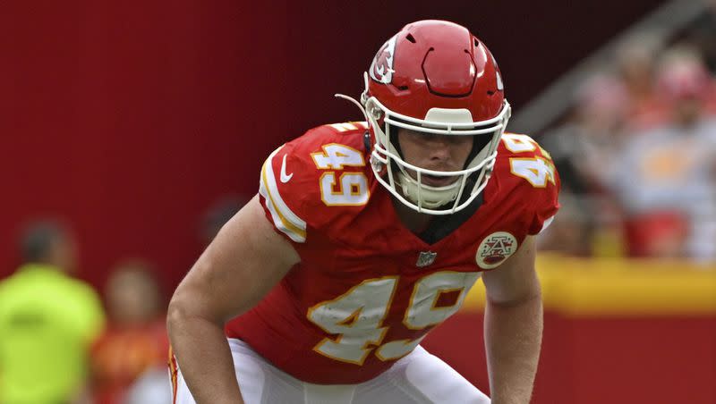 Kansas City Chiefs tight end Matt Bushman (49) gets set before a play during an NFL preseason football game against the Cleveland Browns Saturday, Aug. 26, 2023, in Kansas City, Mo. 