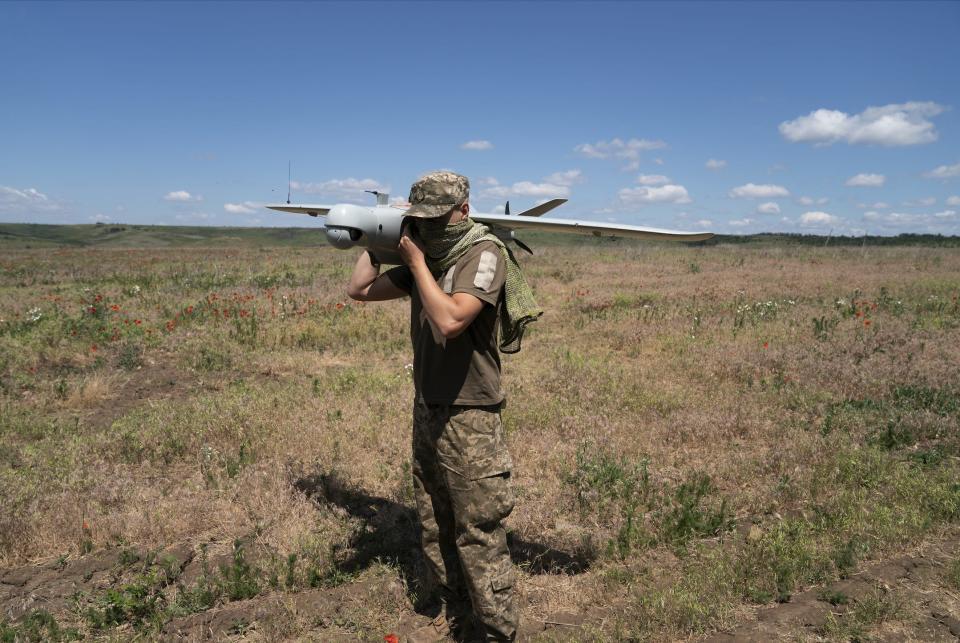 A Ukrainian soldier prepares a LELEKA 100 drone for flight in the direction of Chasiv Yar, in the Donetsk region, on June 10, 2024.