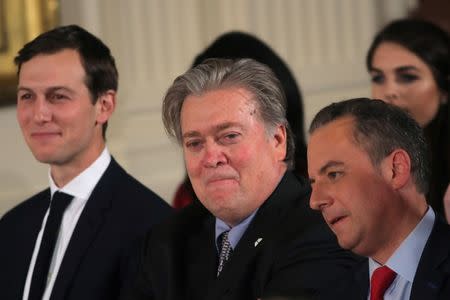 Senior staff at the White House (L-R) Jared Kushner, Steve Bannon and Reince Priebus attend a swearing in ceremony at the White House in Washington, DC January 22, 2017. REUTERS/Carlos Barria