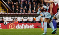 Soccer Football - Premier League - Burnley vs Chelsea - Turf Moor, Burnley, Britain - April 19, 2018 Burnley's Johann Berg Gudmundsson shoots at goal leading to Ashley Barnes scoring their first goal Action Images via Reuters/Andrew Boyers