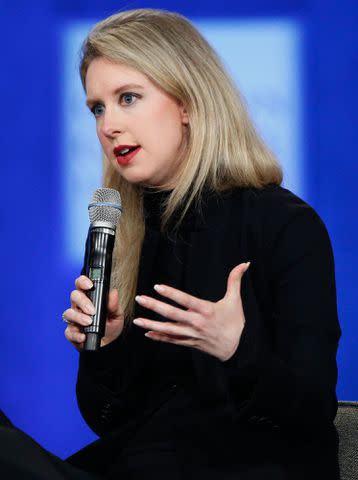 <p>JP Yim/Getty</p> Elizabeth Holmes speaks on stage during the closing session of the Clinton Global Initiative 2015 on September 29, 2015 in New York City.