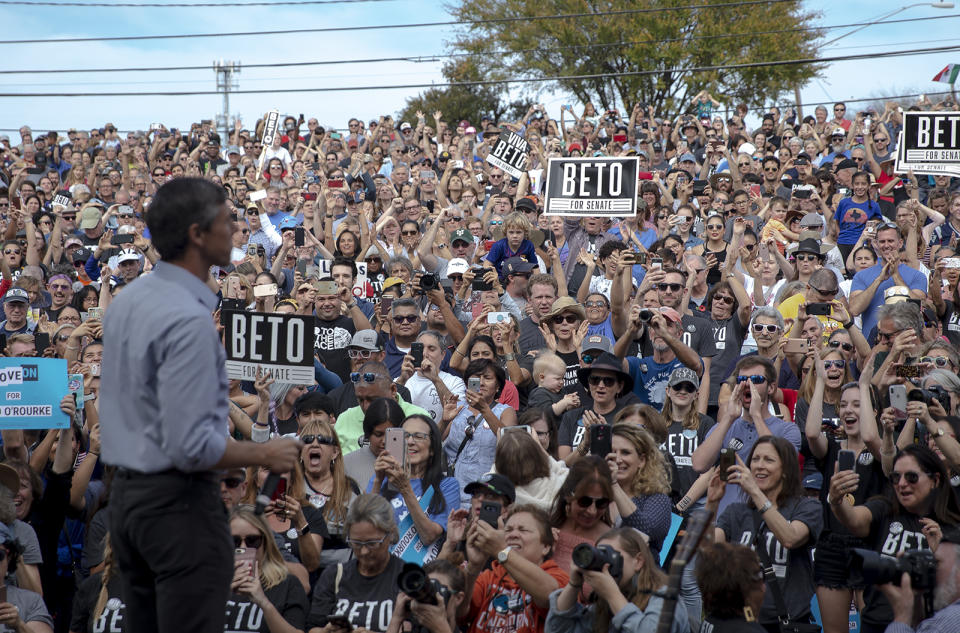 Supporters of Beto O'Rourke, D-El Paso, cheer as he arrives for a rally at the Pan American Neighborhood Park in Austin, Texas, on Sunday, Nov. 4, 2018. (Nick Wagner/Austin American-Statesman via AP)
