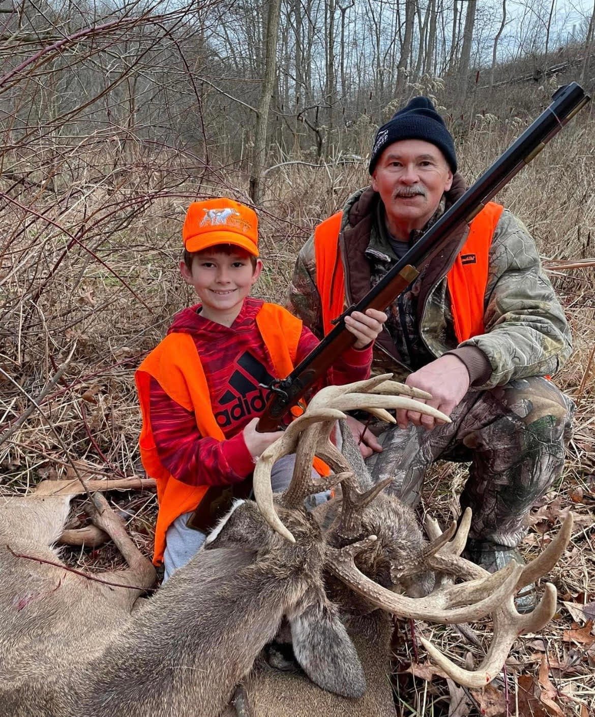 Robert Edwards and his grandson Andrew each killed a buck after their antlers became entangled.