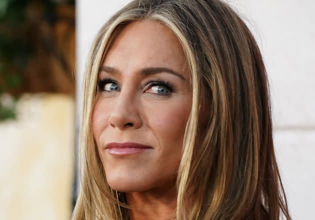 Aniston said she used to “burn out,” but has shifted from excessive to low-impact workouts.