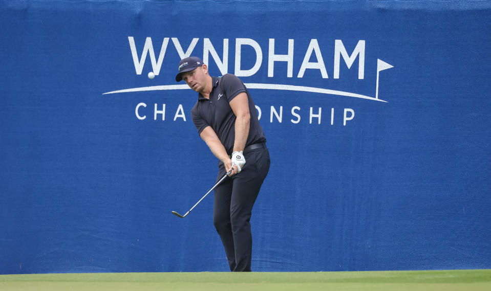 Matt Wallace plays on the fifteenth green during the first round of the Wyndham Championship golf tournament. Mandatory Credit: David Yeazell-USA TODAY Sports