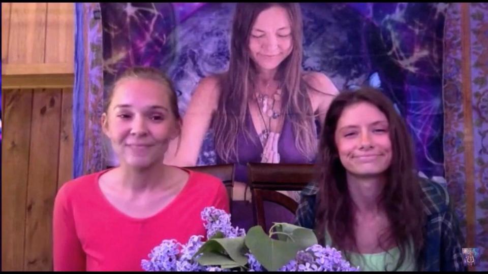 Lauryn Suarez and Ashley Peluso appear on a live stream in front of a banner of Amy Carlson after her death (Love Has Won supplied by Rising Above)