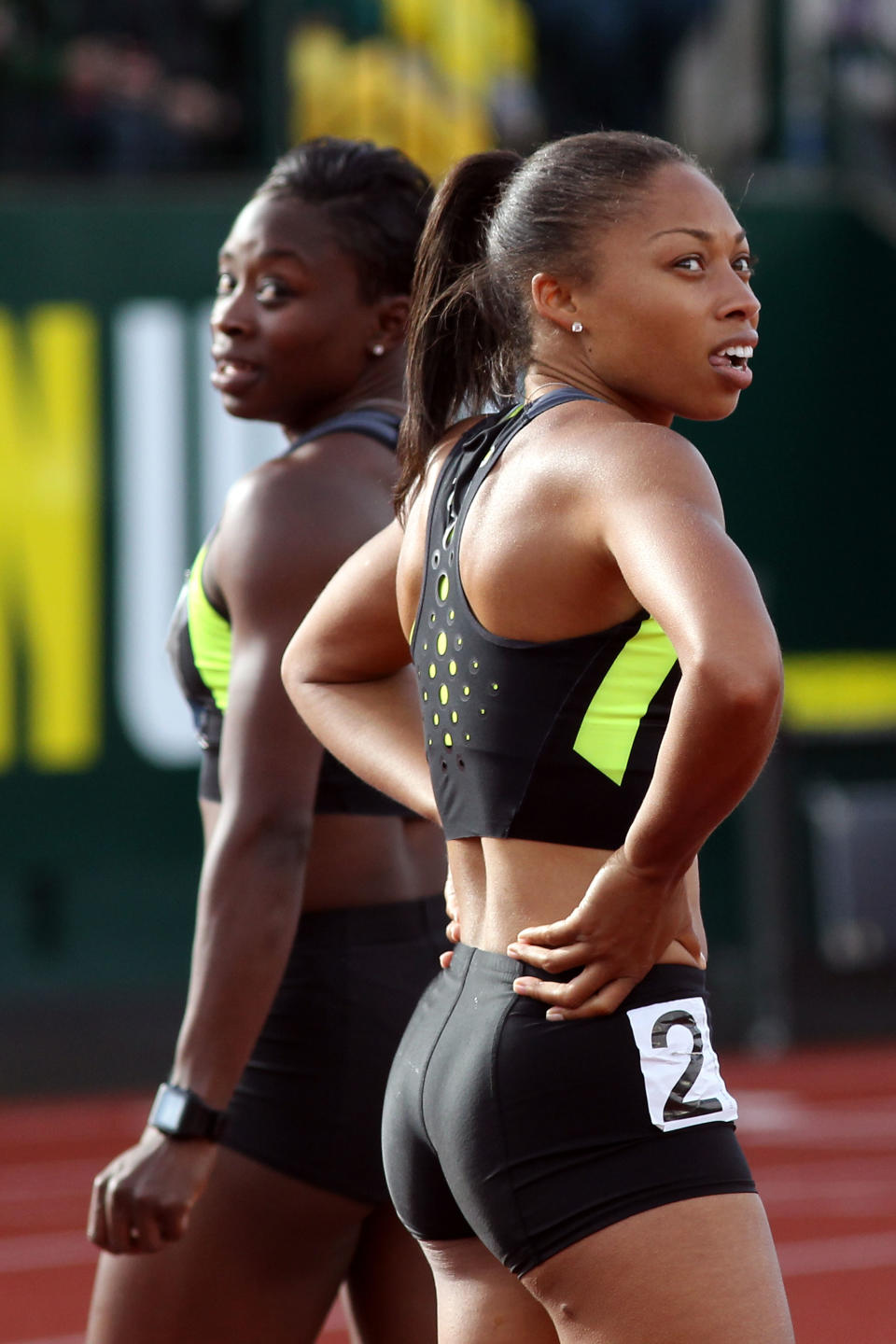 Jeneba Tarmoh (L) and Allyson Felix look on after competing in the women's 100 meter dash final during Day Two of the 2012 U.S. Olympic Track & Field Team Trials at Hayward Field on June 23, 2012 in Eugene, Oregon. (Photo by Michael Heiman/Getty Images)