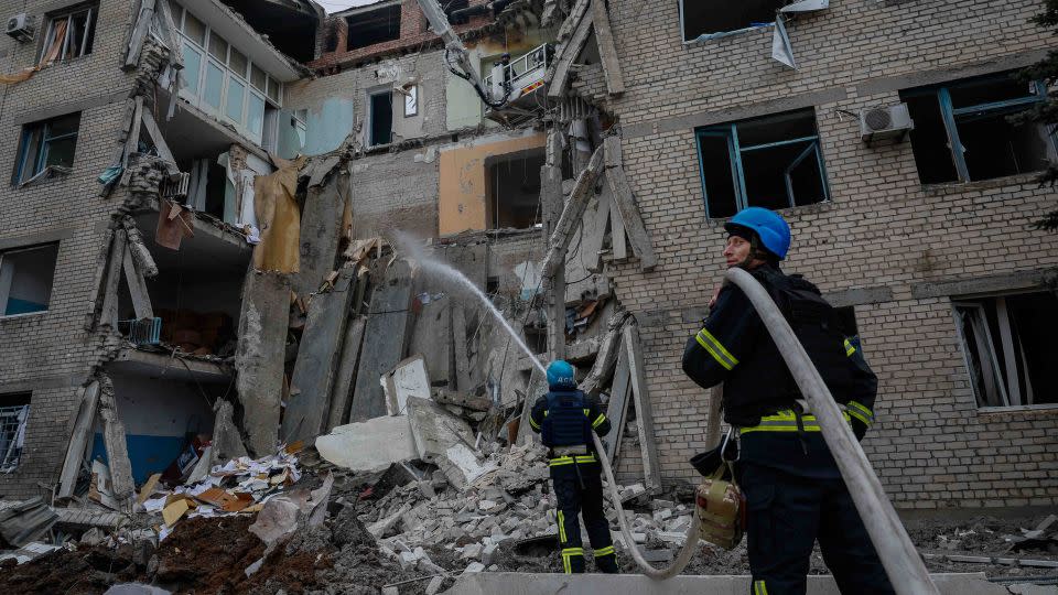 Rescuers work on the side of a hospital which was heavily damaged by a Russian missile strike, amid Russia's attack on Ukraine, in the town of Selydove, Donetsk region, Ukraine November 21, 2023. - Alina Smutko/Reuters